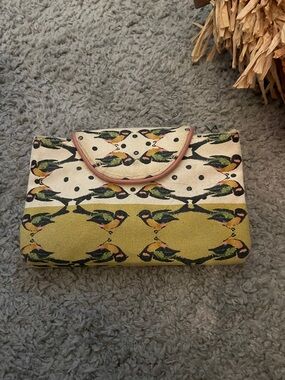 Anthropologie Bird-Print Fold-Over Clutch in Yellow, Cream & Pink Trim